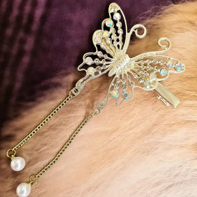 گیره مو زنانه مدل پروانه نگین‌دار مجلسی آویزدار کد brg 879