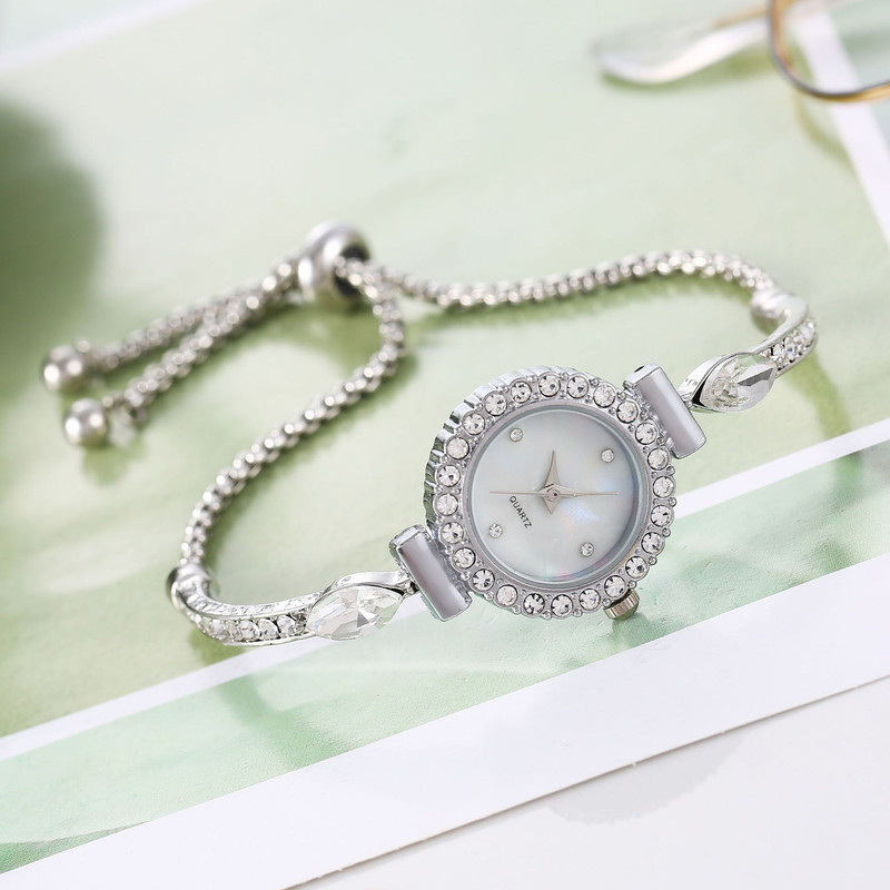 ساعت مچی عقربه ای زنانه مدل  تک نگین بند دستبندی قفل کرواتی کد 012