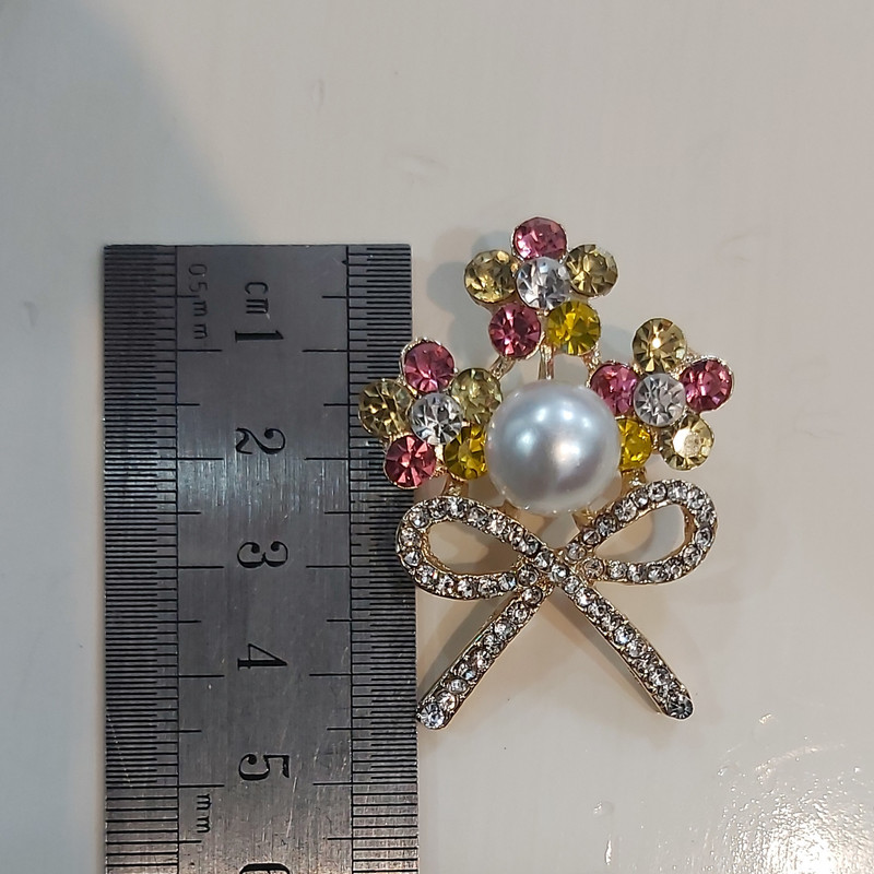 گل سینه دخترانه مدل دسته گل