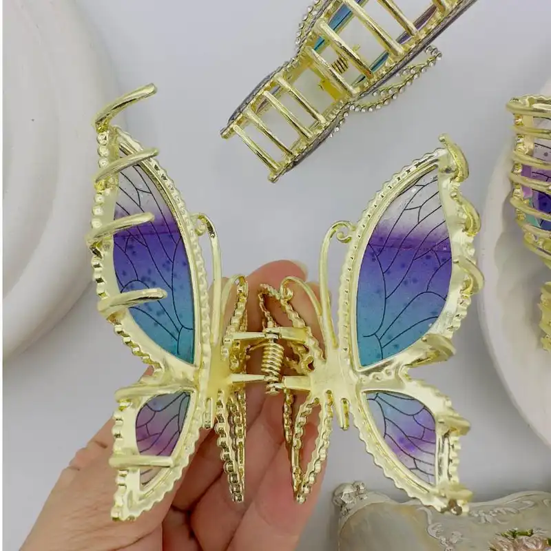 کلیپس مو زنانه مدل پروانه رزینی نگین دار کد  51887