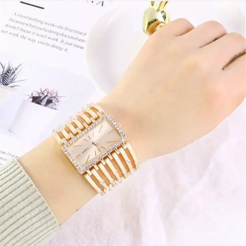 ساعت مچی عقربه ای زنانه مدل دستبندی دورنگین04