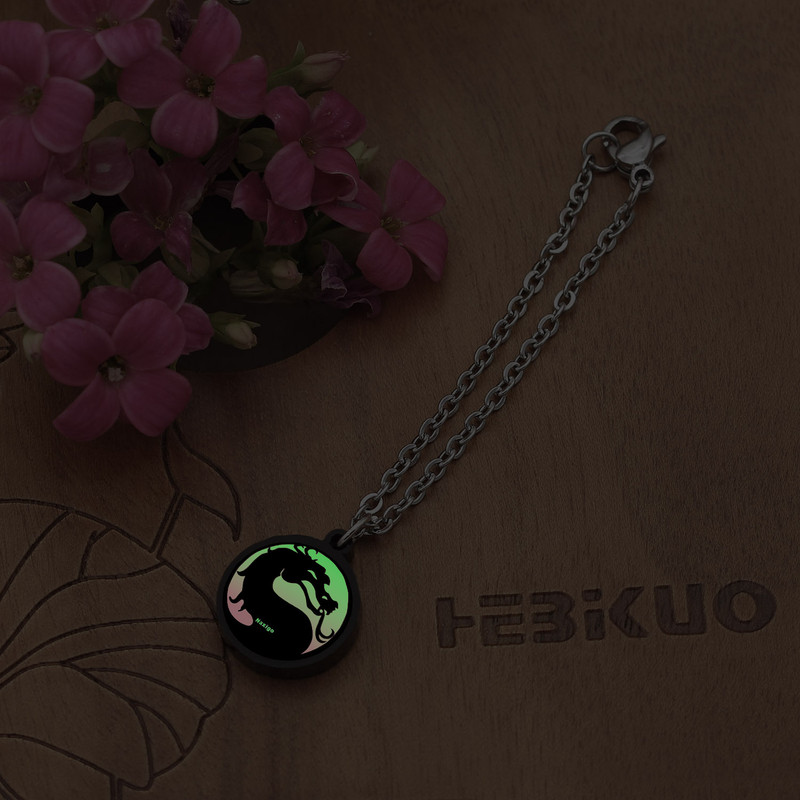 آویز ساعت زنانه ناکسیگو مدل شب تاب طرح مورتال کامبت کد AW9047 آویز ساعت زنانه ناکسیگو مدل شب تاب طرح مورتال کامبت کد AW9047