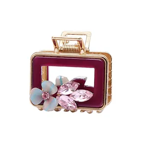 کلیپس مو زنانه مدل غنچه برگ کریستالی