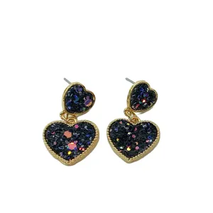 گوشواره زنانه مدل دو قلب نگین دار