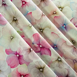 پارچه لباس عرض 1.5 متر مدل ساتن ابریشم طرح گل آبرنگی رنگ صورتی روشن