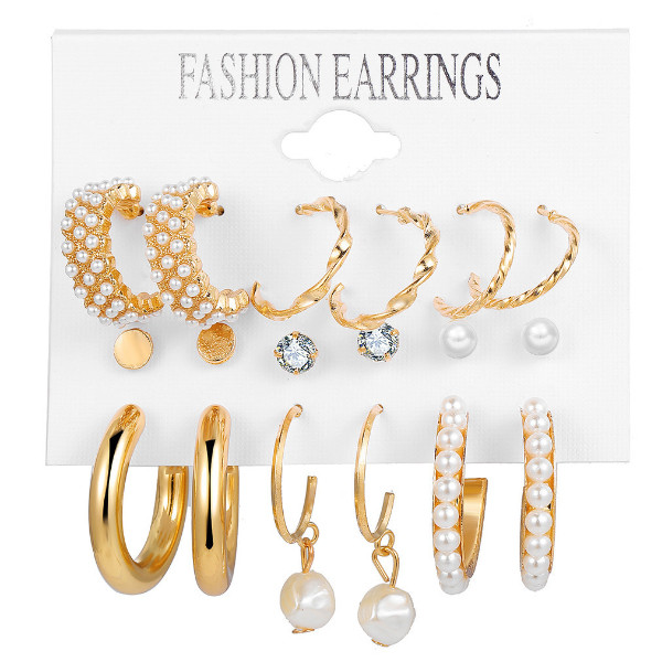 گوشواره دخترانه مدل حلقه ای مرواریدی بسته 9 عددی گوشواره دخترانه مدل حلقه ای مرواریدی بسته 9 عددی