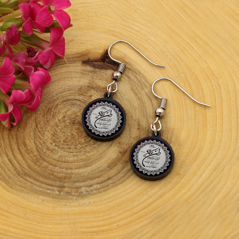 گوشواره زنانه ناکسیگو مدل شب تاب طرح و ان یکاد کد ES8077