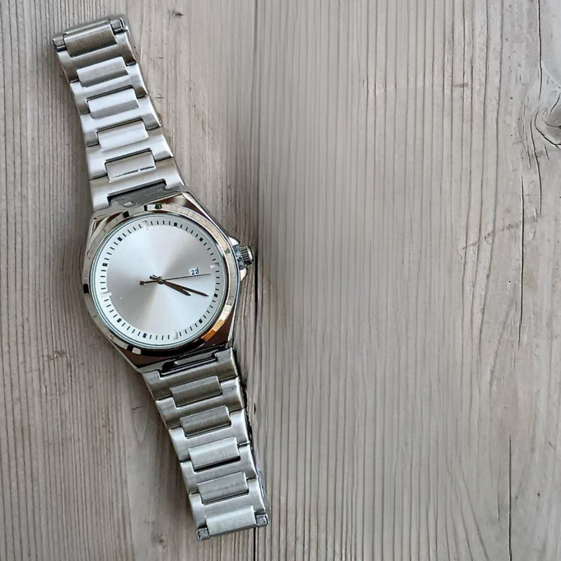 ساعت مچی عقربه‌ای مردانه کوارتز مدل کلاسیک بند استیل کد 1.1