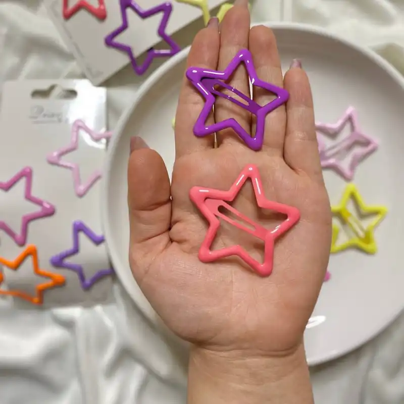 گیره مو زنانه مدل تق تقی ستاره ای کد kh999