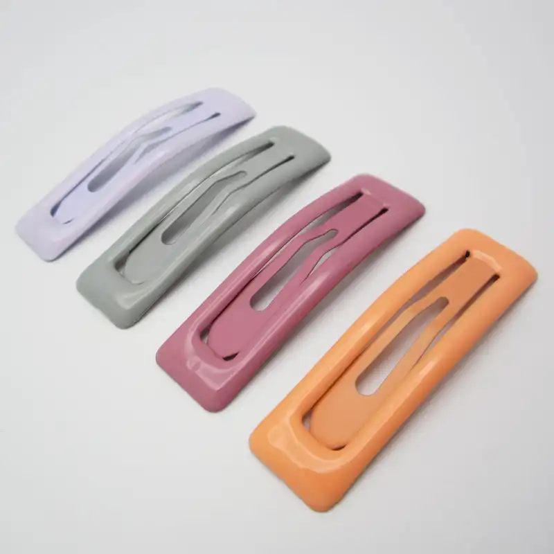 گیره مو زنانه مدل تق تقی لاکی کد 2 بسته 4 عددی