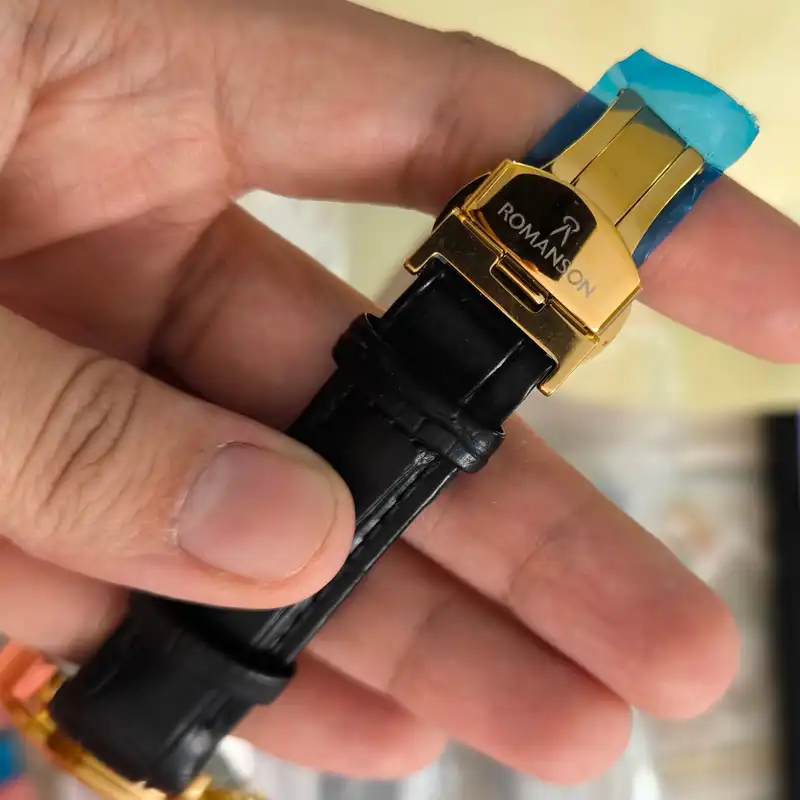 ست ساعت مچی عقربه ای زنانه و مردانه رومانسون مدل تک موتوره بند چرم قفل فیکس کد 1