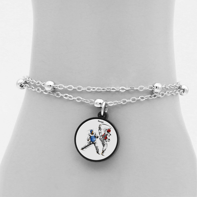 پابند زنانه ناکسیگو مدل شب تاب طرح تکواندو کد LB7396 پابند زنانه ناکسیگو مدل شب تاب طرح تکواندو کد LB7396