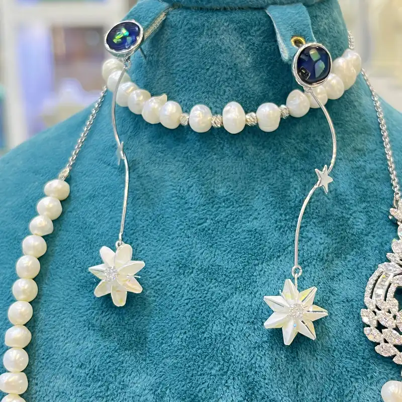 نیم ست نقره زنانه مدل دستساز مزین به مروارید طبیعی 44-24