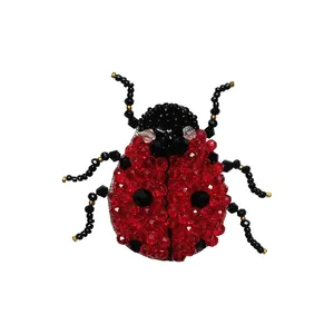 گل سینه زنانه مدل کفشدوزک کد 5036