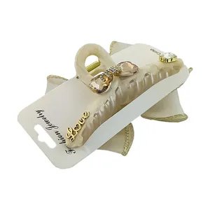 کلیپس مو زنانه مدل فانتزی نگین دار طرح قلب و پاپیون کد 23971