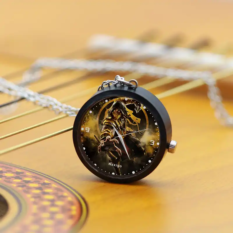 ساعت گردنبندی عقربه ای ناکسیگو مدل مورتال کامبت کد NF12804