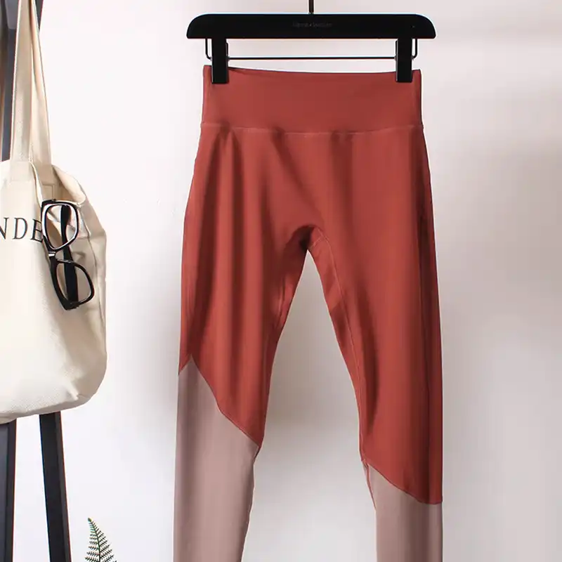 لگینگ ورزشی زنانه مدل کمر گنی 10 سانتی رنگ نارنجی