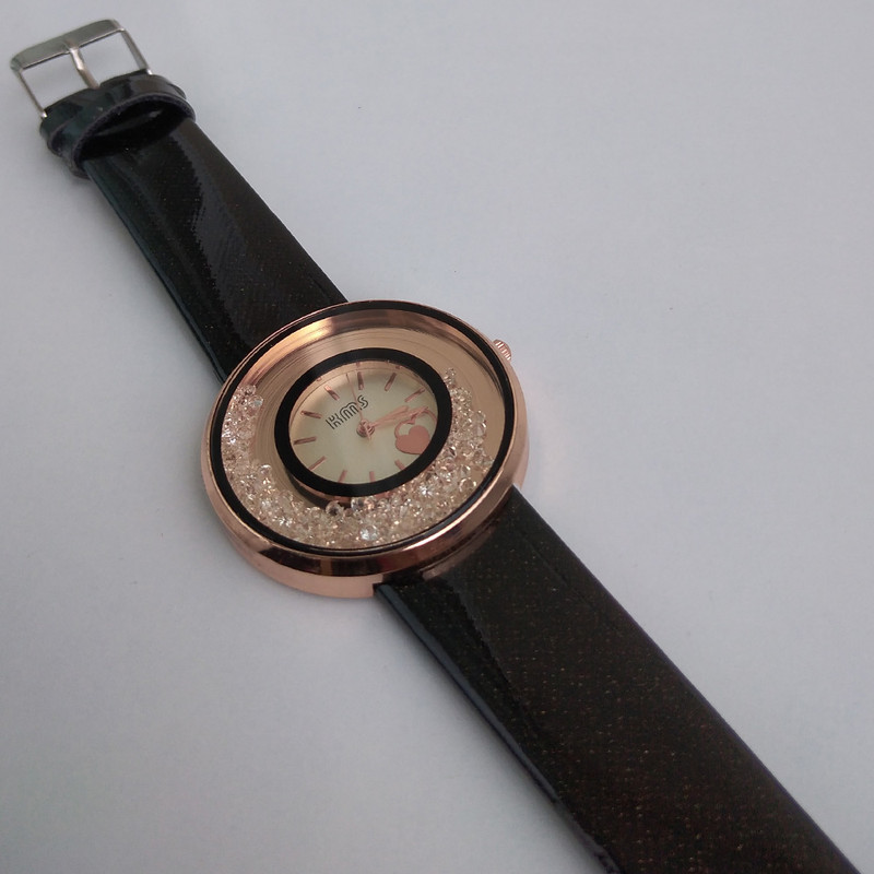 ساعت مچی عقربه ای دخترانه مدل دورشنی کد 422