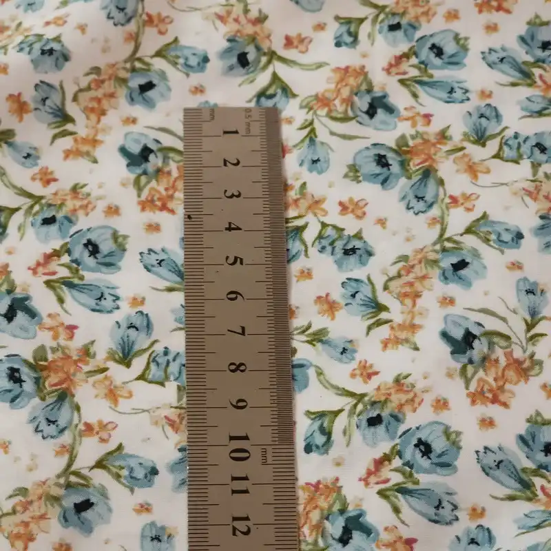 پارچه لباس مدل کودری نخی طرح گلریزان کد MC