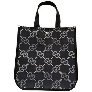 ساک دستی مدل دکمه‌ای طرح ضربدری