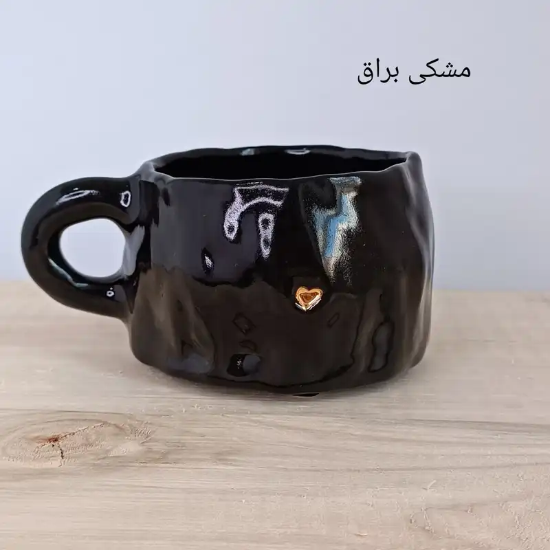 ماگ سرامیکی مدل دفرمه طرح قلب