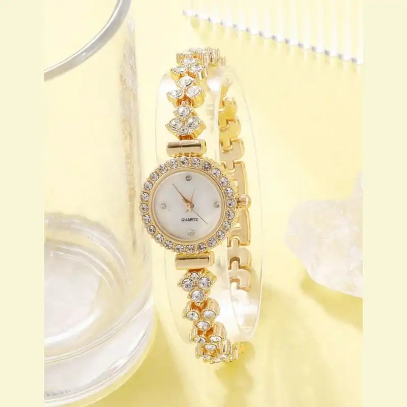 ساعت مچی عقربه ای زنانه مدل دور نگین شکوفه کد 02