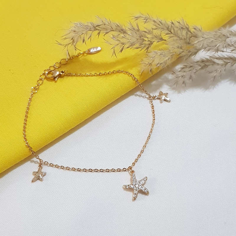 دستبند زنانه ژوپینگ مدل ستاره دریایی نگینی 3334