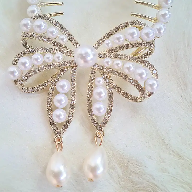 گیره مو زنانه مدل گوجه ای پاپیون مرواریدی کد 4275