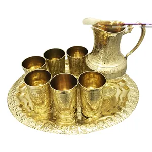 سرویس پارچ و لیوان برنجی طرح گل مجموعه 8 عددی