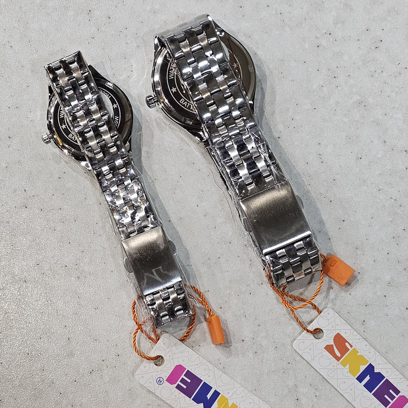 ست ساعت مچی عقربه ای زنانه و مردانه اسکمی مدل 9071 کد 11