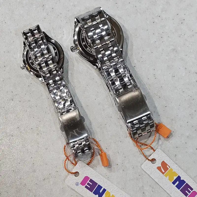 ست ساعت مچی عقربه ای زنانه و مردانه اسکمی مدل 9071 کد 11