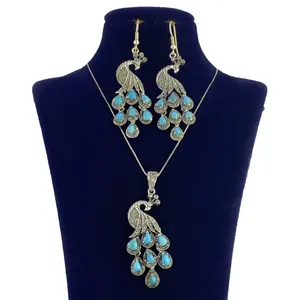 نیم ست نقره زنانه طرح طاووس کد ARAZ-710