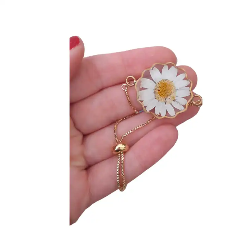 دستبند زنانه رزینی مدل بابونه طبیعی