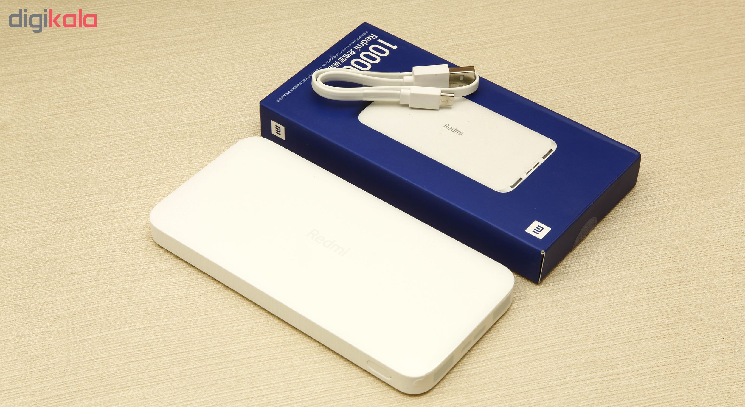 شارژر همراه شیائومی مدل Redmi ظرفیت 10000 میلی آمپرساعت به همراه کابل تبدیل microUSB