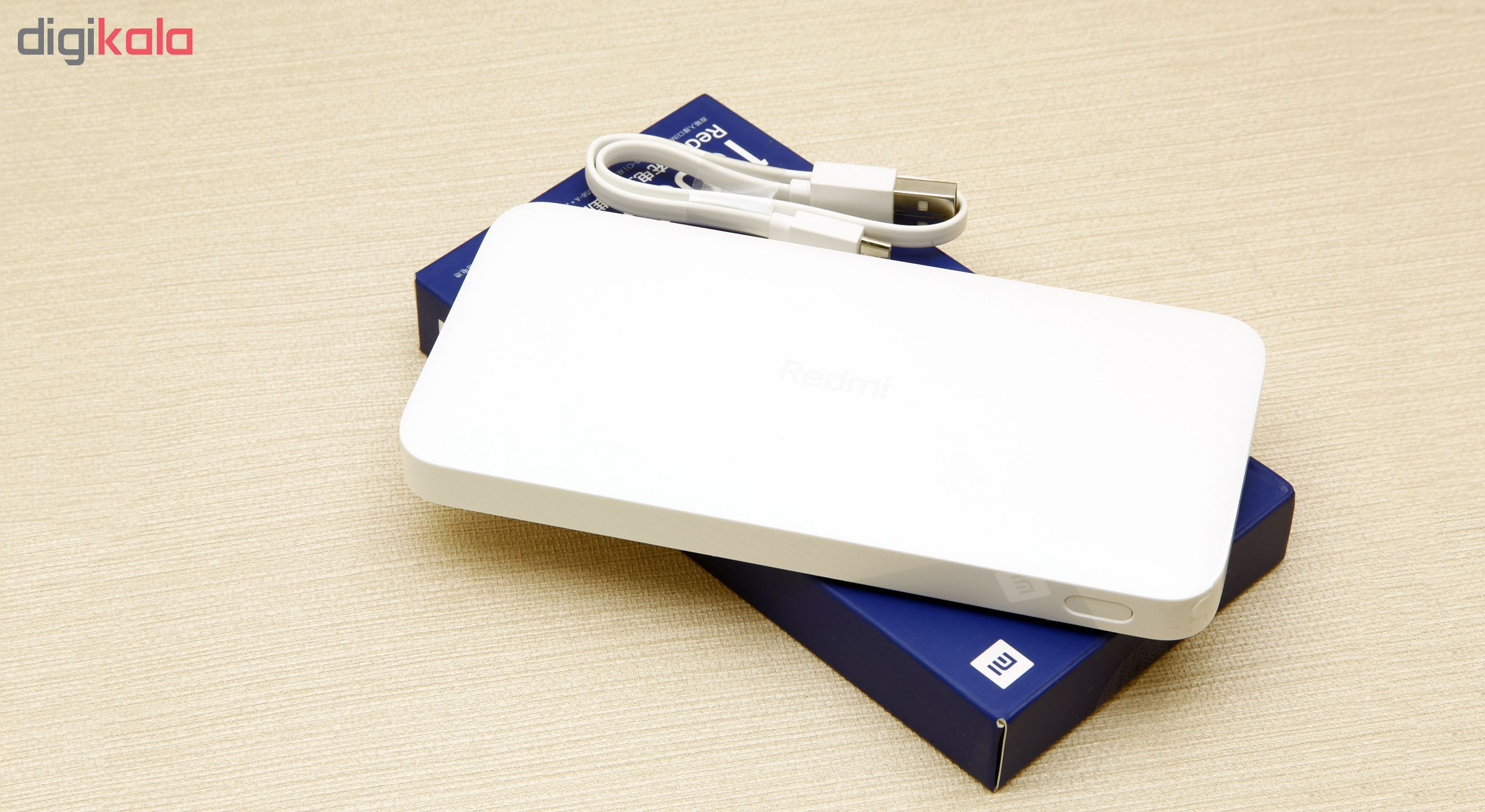 شارژر همراه شیائومی مدل Redmi ظرفیت 10000 میلی آمپرساعت به همراه کابل تبدیل microUSB