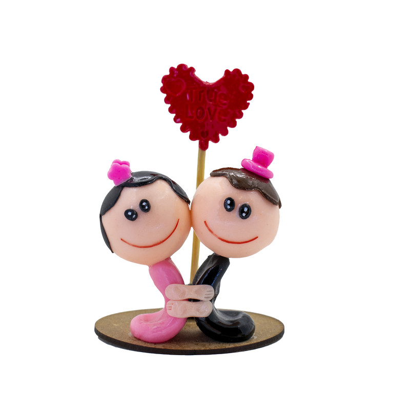 مجسمه طرح عروس و داماد