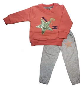 ست سویشرت و شلوار بچگانه طرح  ستاره درخشان رنگ نارنجی 