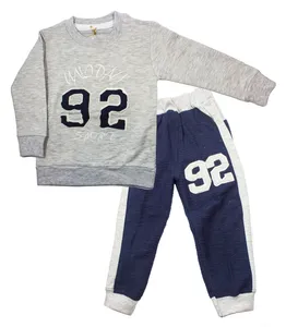 ست سویشرت و شلوار بچگانه طرح فوتبال رنگ سرمه ای طوسی