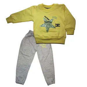 ست سویشرت و شلوار بچگانه طرح  ستاره درخشان رنگ زرد 