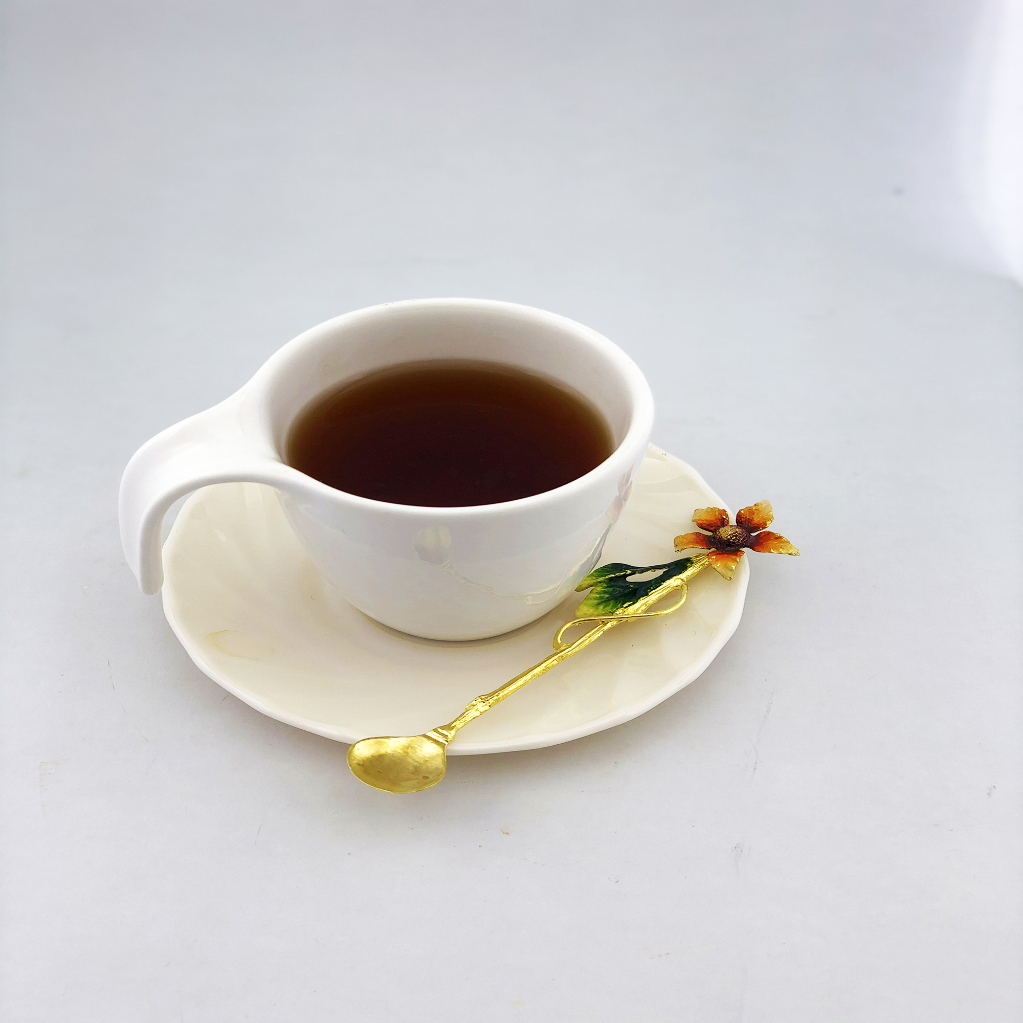 قاشق چای خوری طرح گل آفتابگردان مدل GZ98670