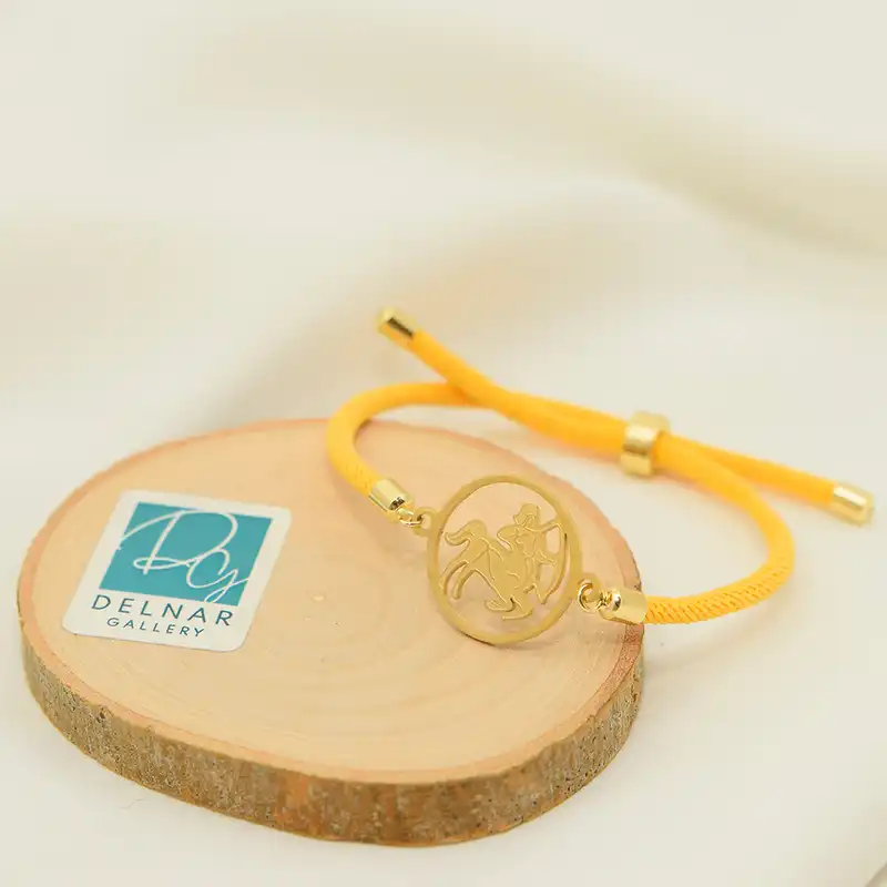 دستبند زنانه دلنار گالری مدل کنفی آسانسوری نماد ماه تولد آذر