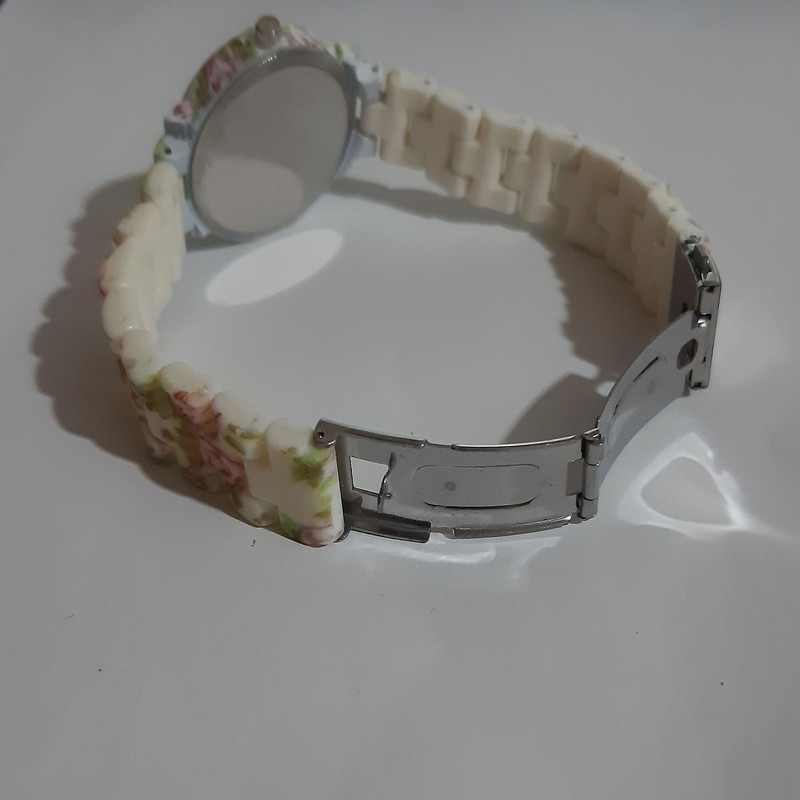 ساعت مچی عقربه ای دخترانه مدل DM 65 ساعت مچی عقربه ای دخترانه مدل DM 65