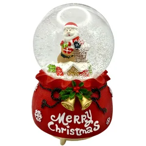 گوی موزیکال مدل پمپی بابانوئل و کیسه هدایا طرح زنگوله کریسمس کد PA4014