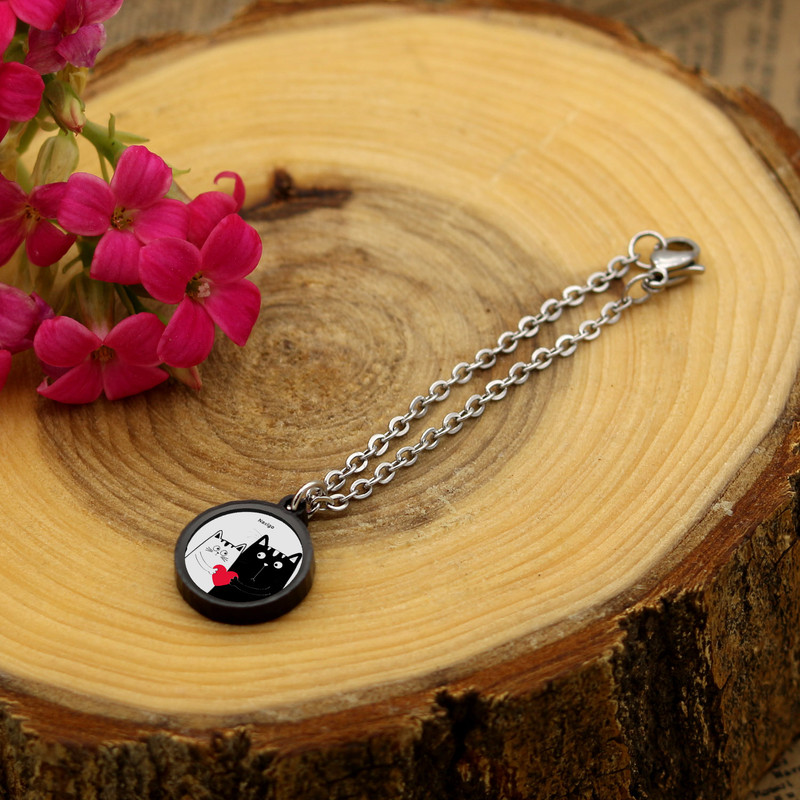 آویز ساعت زنانه ناکسیگو مدل شب تاب طرح گربه کد AW8804