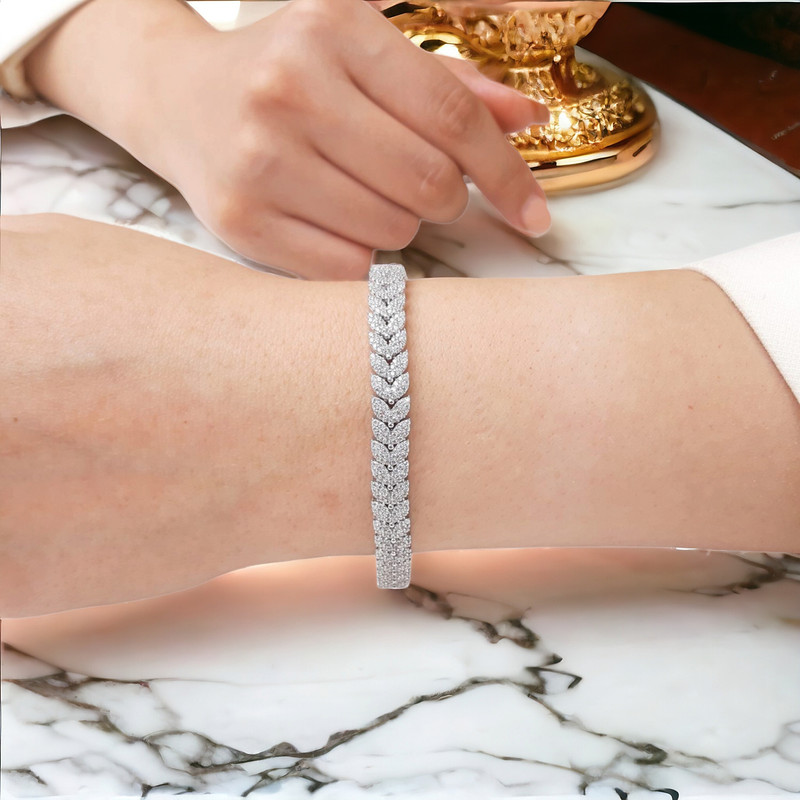 دستبند نقره زنانه گالری رضازاده مدل گلبرگ کد 0153