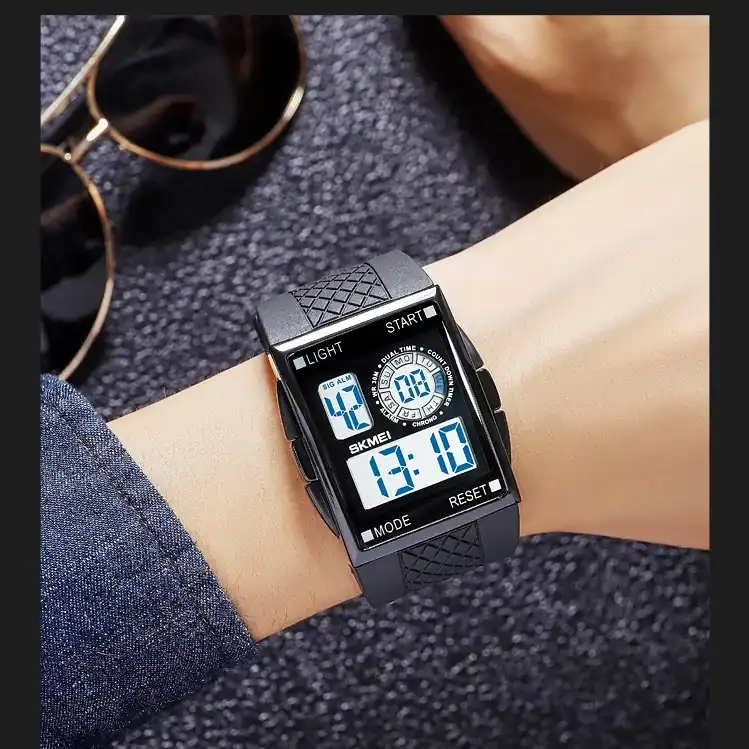 ساعت مچی دیجیتال اسکمی مدل دو زمانه کرنوگراف بند پیو