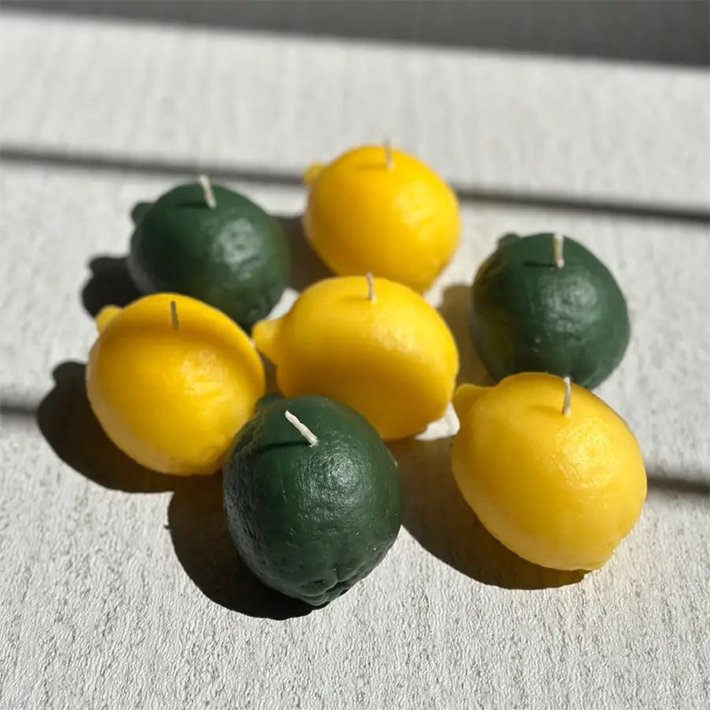 شمع دست ساز معطر مدل لیمو با رایحه لیمو  زمان اتمام 4 ساعت