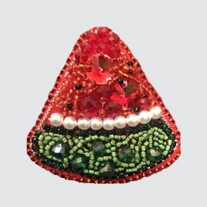 گل سینه زنانه مدل هندوانه