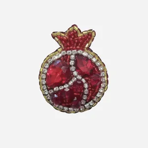 گل سینه زنانه مدل انار یلدا