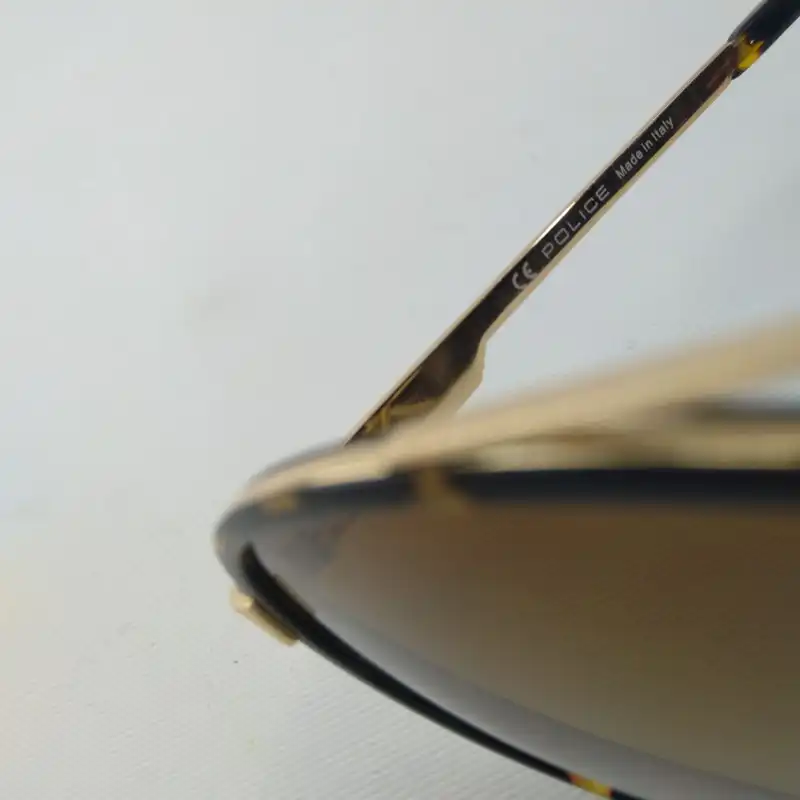 عینک آفتابی مردانه پلیس مدل SPL 781 002